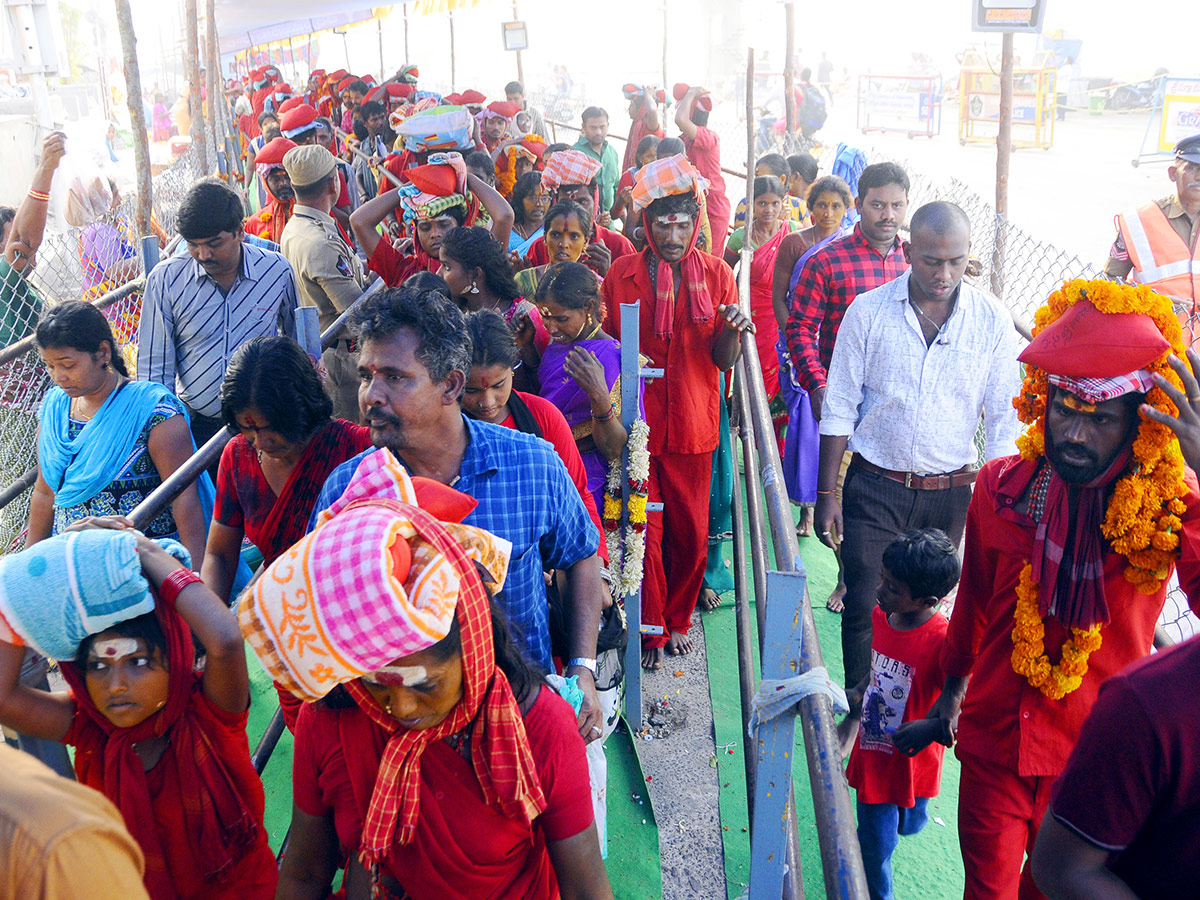 Bhavani Deeksha Maladharana begins in Vijayawada Photo Gallery - Sakshi