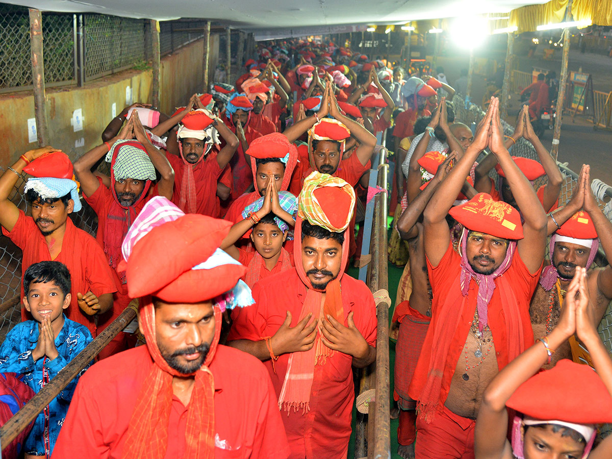 Bhavani Deeksha Maladharana begins in Vijayawada Photo Gallery - Sakshi