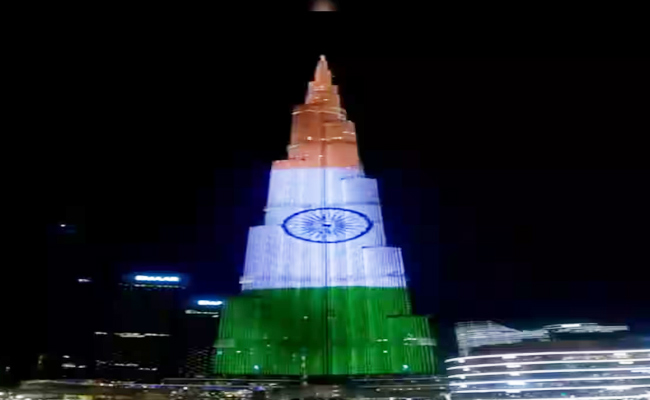 Burj Khalifa Lit Up With Indian Tricolour And Modis Name - Sakshi