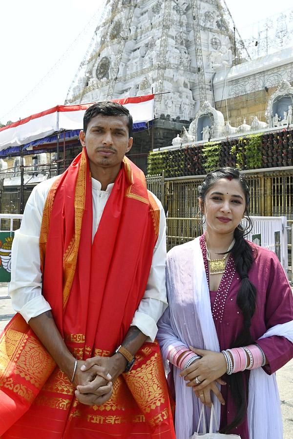 Cricketer Navdeep Saini visits Tirumala With His Wife Photos - Sakshi