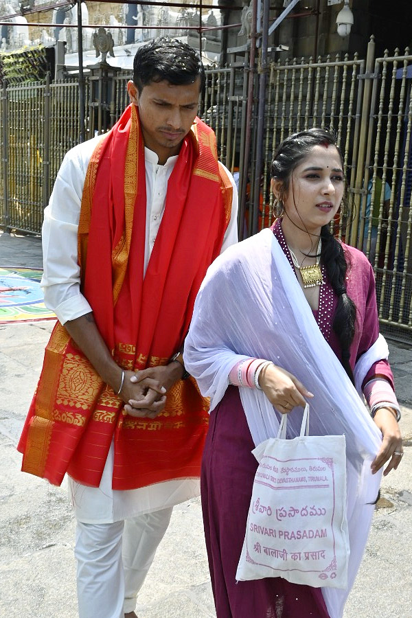 Cricketer Navdeep Saini visits Tirumala With His Wife Photos - Sakshi