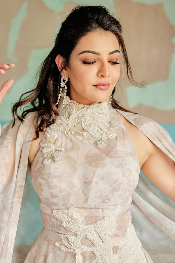 Actress Kajal Aggarwal Shares Stunning Photos in White Dress9