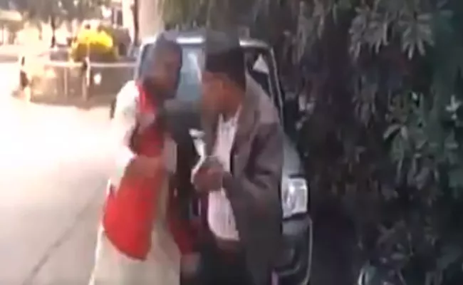 BJP leader Rajdhani Yadav slaps District transport officer - Sakshi