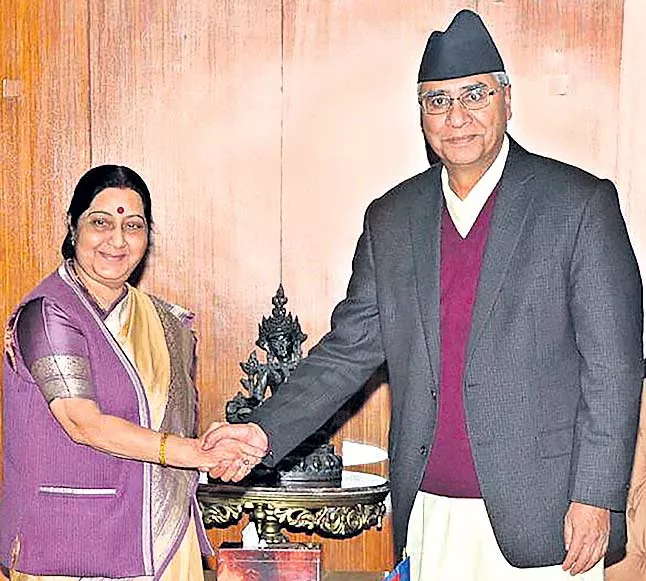 Sushma Swaraj In Kathmandu, India Budgets For Better Ties With Nepal - Sakshi