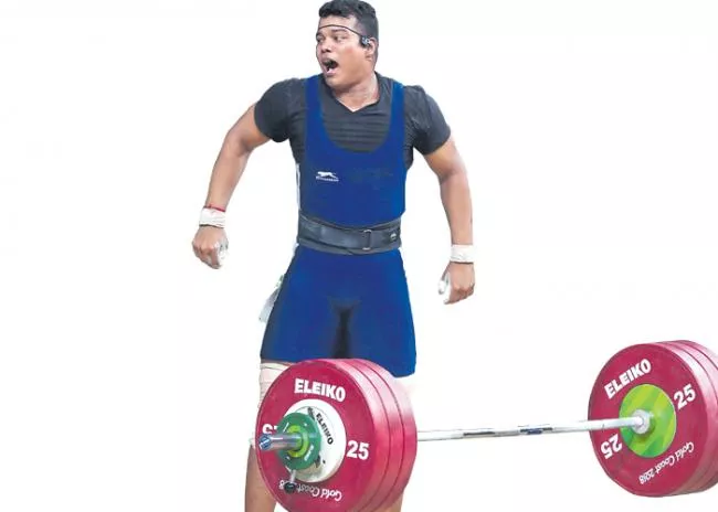 4th gold for India as Rahul Ragala gets medal in weightlifting - Sakshi