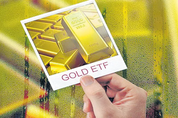 Investors continue to exit from Gold ETFs in April - Sakshi