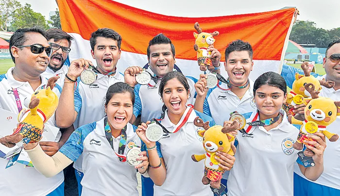 Archery: Silver for mens, women's teams in Asiad compound - Sakshi