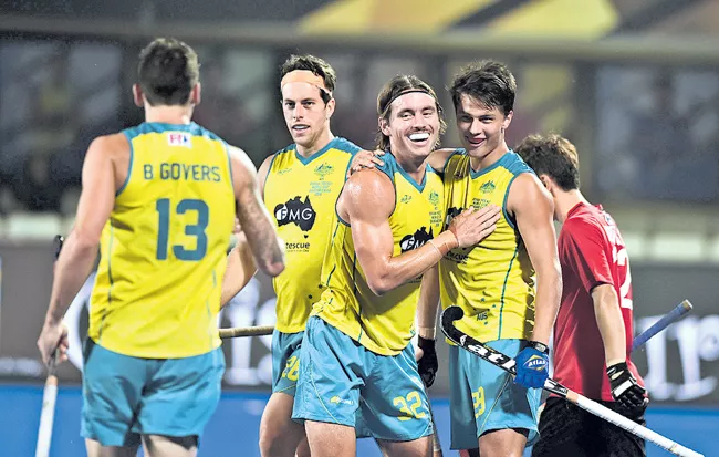  Hockey World Cup: Defending champions Australia beat England 3-0 - Sakshi