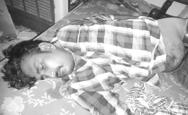 Man died With Suicide In Gudivada - Sakshi