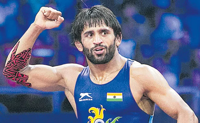 World number one Bajrang Poonia aims to win gold in wrestling - Sakshi