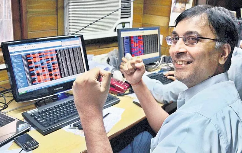 Nifty, Sensex at record highs - Sakshi