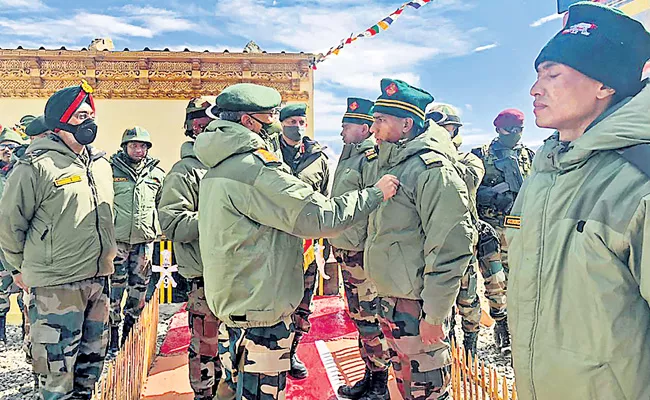 India-China hold diplomatic talks to ease border tension - Sakshi