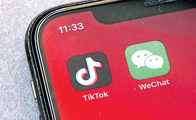 TikTok and WeChat by America - Sakshi