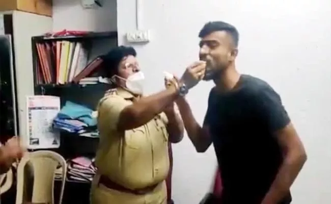 Mumbai Cop Caught On Camera Feeding Cake To Criminal Became Viral - Sakshi