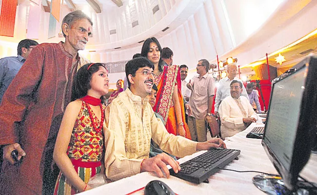 Sensex, Nifty tick higher as Samvat 2078 begins on auspicious note - Sakshi