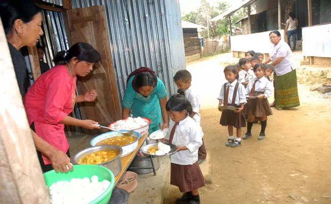 Upper caste students boycott midday meal cooked by Dalit Women - Sakshi