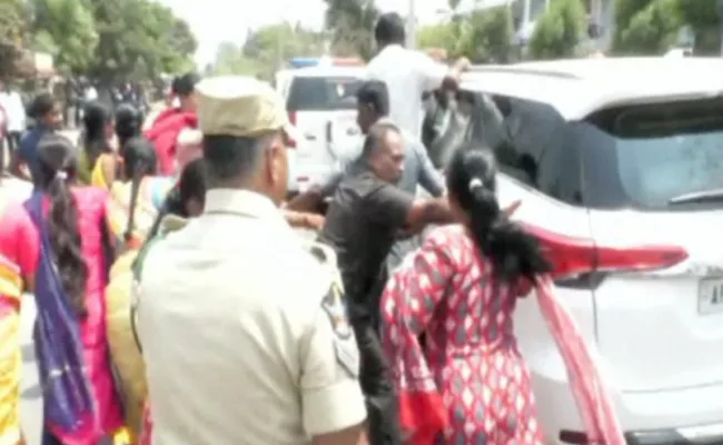 TDP Activists Attempt To Attack Home Minister Taneti Vanitha Convoy In Prakasam - Sakshi