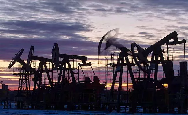 Global Oil prices record high concerns on petrol price - Sakshi