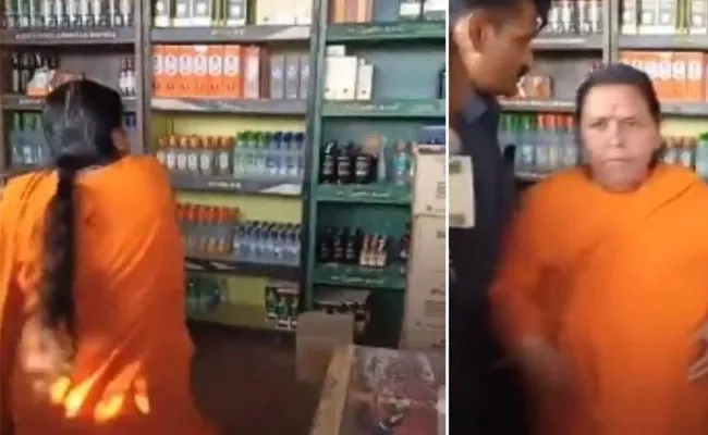 Uma Bharti Throws Cow Dung On Liquor Shop Madhya Pradesh - Sakshi