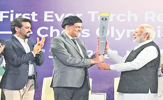 PM Narendra Modi flags off first-ever torch relay for Chess Olympiad - Sakshi