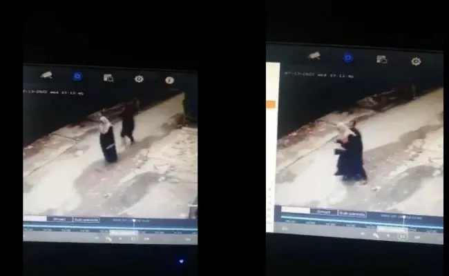 Viral Video: Man gropes burqa clad woman harasses in Pakistan - Sakshi