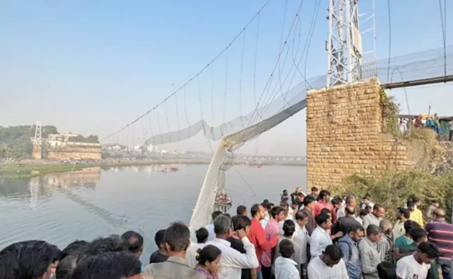 Gujarat HC Strong Remarks On Gujarat Bridge Tragedy - Sakshi
