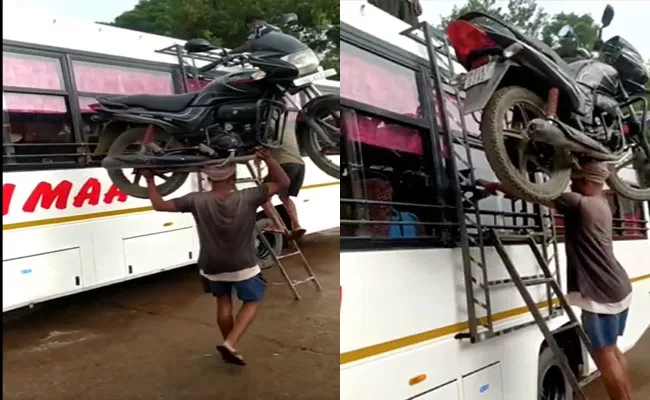 Viral Video: Man Climbs Bus Ladder With Motorbike On His Head - Sakshi