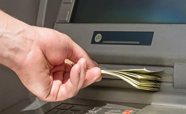 Bank Customers Withdraw Their Money From Atm Machine Without Debit Card - Sakshi