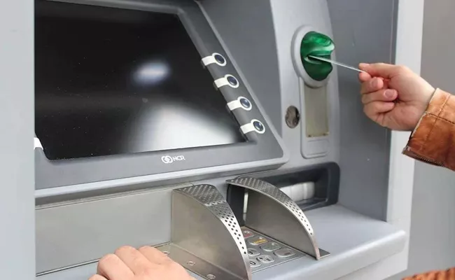 ATM fraud alert debit card credit card fraud at atm machine - Sakshi