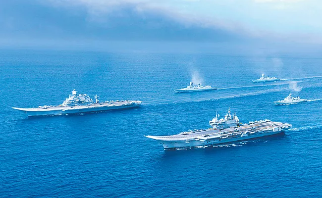 India Navy conducts mega operation involving two aircraft carriers, over 35 combat planes - Sakshi