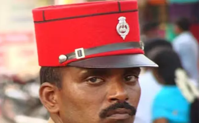 puducherry police red cap uniform history - Sakshi