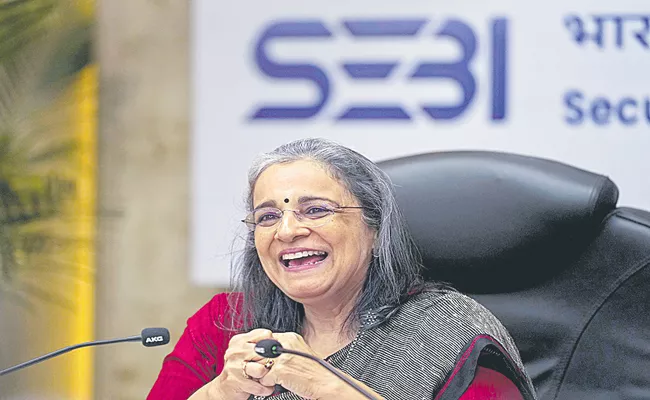 Tplus1 redemption and allotment for mutual fund units says sebi Chairperson Madhabi Puri Buch - Sakshi