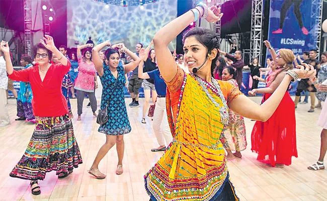 Health Experts Said Nine Days In Navratri Performed Dance Is Health Tandavam - Sakshi