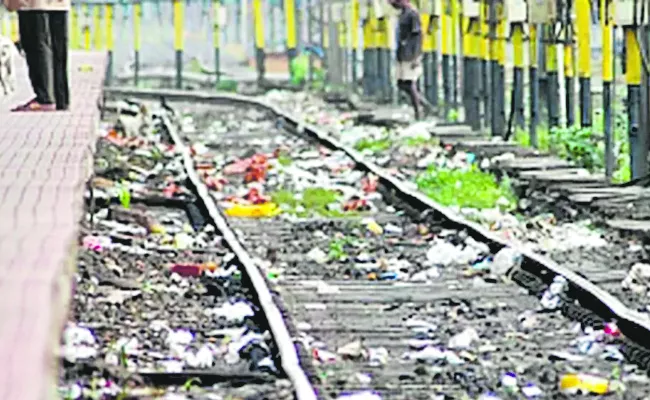 TELANGANA : Huge piles of garbage on rail tracks  - Sakshi