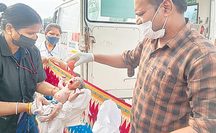 A woman gives birth at a bus stand