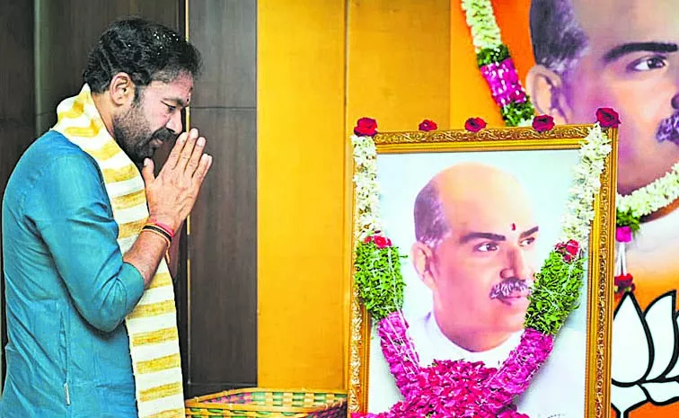 Kishan Reddy pays tribute to Shyamaprasad Mukherjee at party office