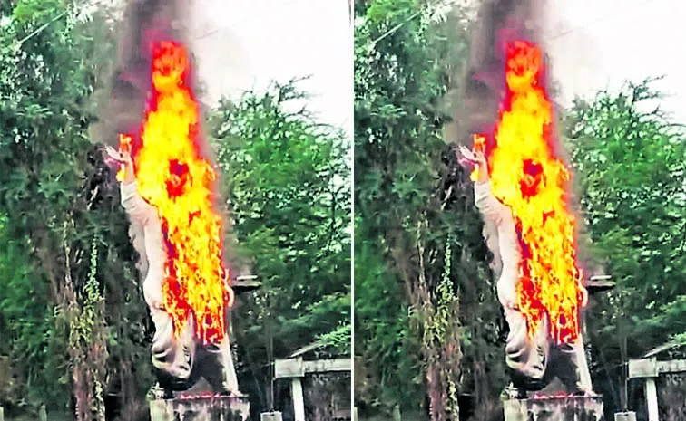 TDP Activists Set Fire to YS Rajasekhara Reddy Statue at Bapatla