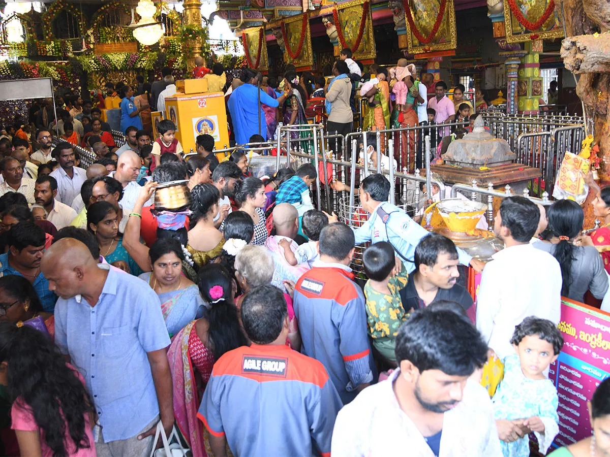 Huge Rush of Devotees at Vijayawada Kanaka Durga temple - Sakshi